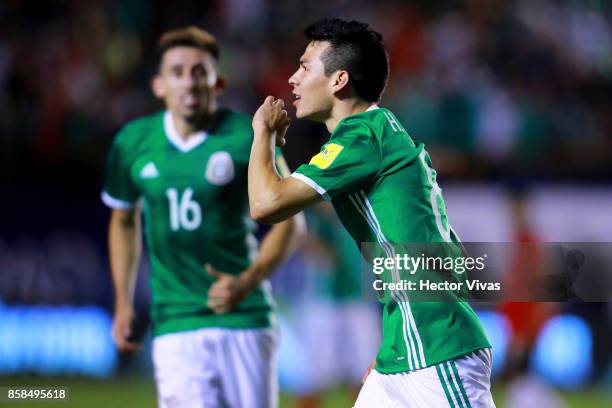 Hirving Lozano of Mexico celebrates after scoring the first goal of his team during the match between Mexico and Trinidad & Tobago as part of the...