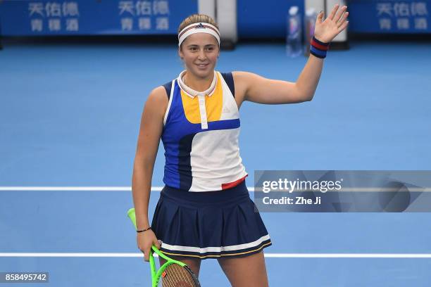 Jelena Ostapenko of Latvia celebrates after winning the Women's Quarter finals match against Sorana Cirstea of Romania on day seven of the 2017 China...