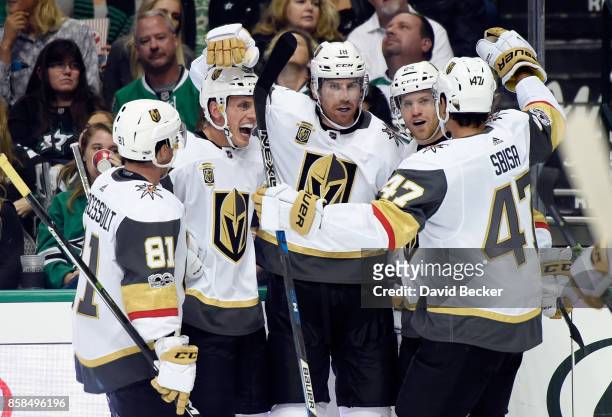 Jonathan Marchessault, Nate Schmidt, James Neal, Oscar Lindberg and Luca Sbisa of the Vegas Golden Knights react after Neal scored a goal against the...