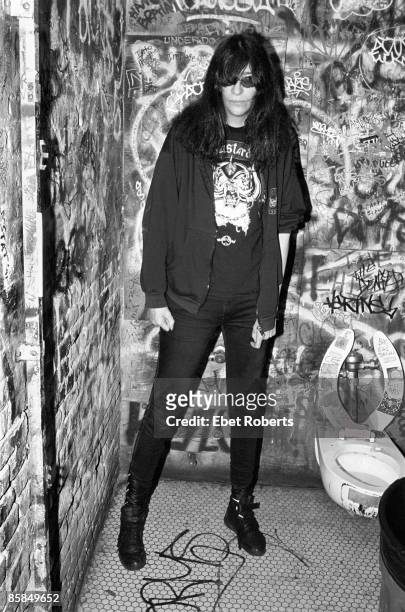 Joey Ramone of the Ramones inside the bathroom at CBGB's in New York City on December 20, 1993.