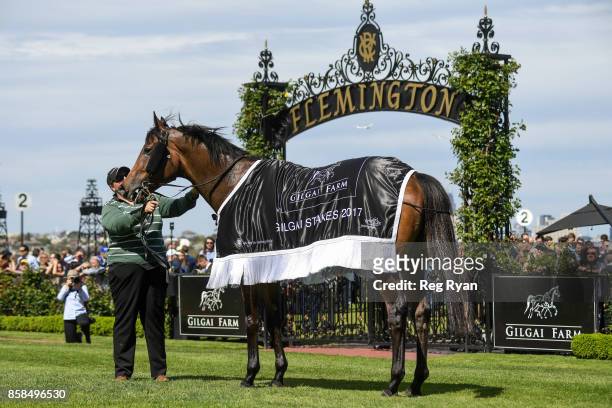 Keen Array with strapper Jess Carmichael after winning the Gilgai Stakes at Flemington Racecourse on October 07, 2017 in Flemington, Australia.