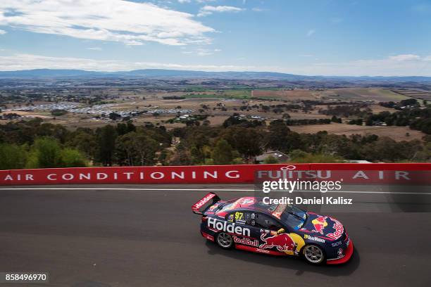 Shane Van Gisbergen drives the Red Bull Holden Racing Team Holden Commodore VF during practice ahead of this weekend's Bathurst 1000, which is part...