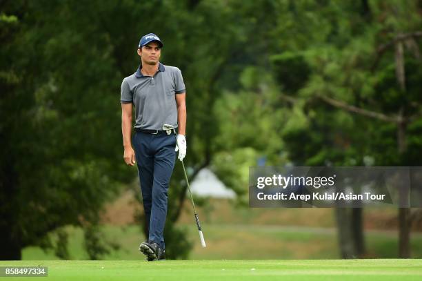 Ajeetesh Sandhu of India during round three of the Yeangder Tournament Players Championship at Linkou lnternational Golf and Country Club on October...