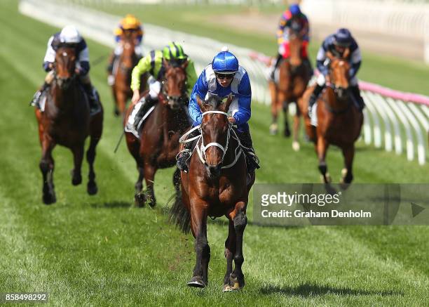 Hugh Bowman rides Winx to win the Seppelt Turnbull Stakes during Turnbull Stakes Day at Flemington Racecourse on October 7, 2017 in Melbourne,...