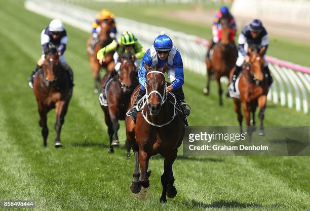 Hugh Bowman rides Winx to win the Seppelt Turnbull Stakes during Turnbull Stakes Day at Flemington Racecourse on October 7, 2017 in Melbourne,...