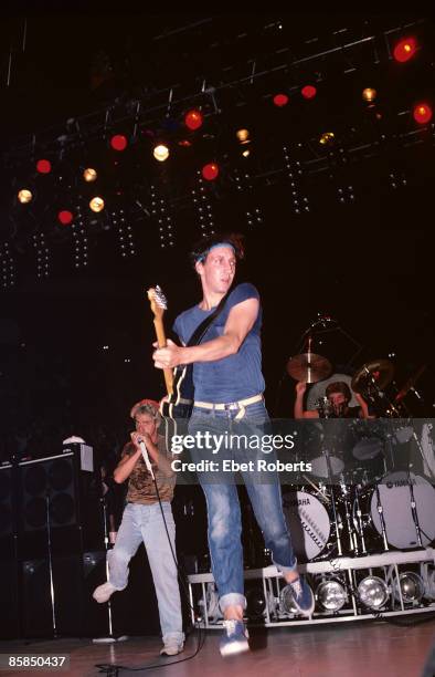 Photo of The Who and Pete TOWNSHEND and Kenney JONES and Roger DALTREY, L-R: Roger Daltrey, Pete Townshend, Kenney Jones performing live onstage