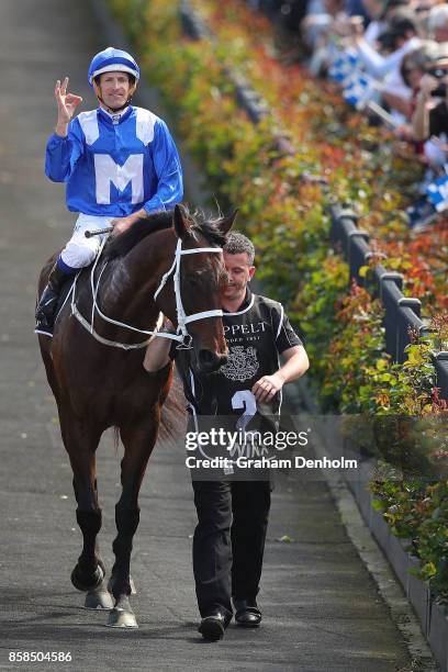 Hugh Bowman returns to scale after riding Winx to win the Seppelt Turnbull Stakes during Turnbull Stakes Day at Flemington Racecourse on October 7,...