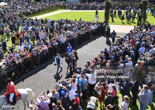 Hugh Bowman riding Winx in front of huge crowd before winning Race 5, Turnbull Stakes during Turnbull Stakes day at Flemington Racecourse on October...