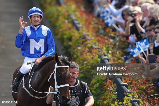 Hugh Bowman returns to scale after riding Winx to win the Seppelt Turnbull Stakes during Turnbull Stakes Day at Flemington Racecourse on October 7,...