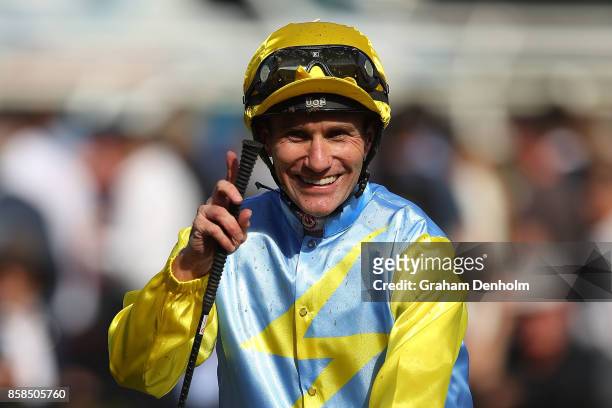 Luke Currie smiles after riding Bring Me Roses to win the TAB Edward Manifold Stakes during Turnbull Stakes Day at Flemington Racecourse on October...