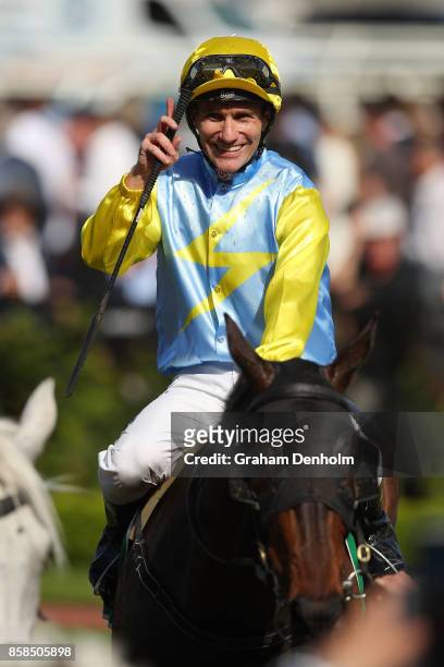 Luke Currie smiles after riding Bring Me Roses to win the TAB Edward Manifold Stakes during Turnbull Stakes Day at Flemington Racecourse on October...