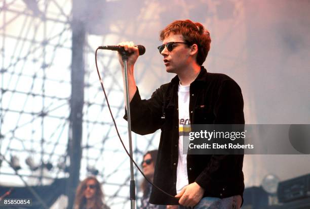 Photo of Jim REID and JESUS & MARY CHAIN, Jim Reid performing on stage at Montage Mountain, Pennsylvania