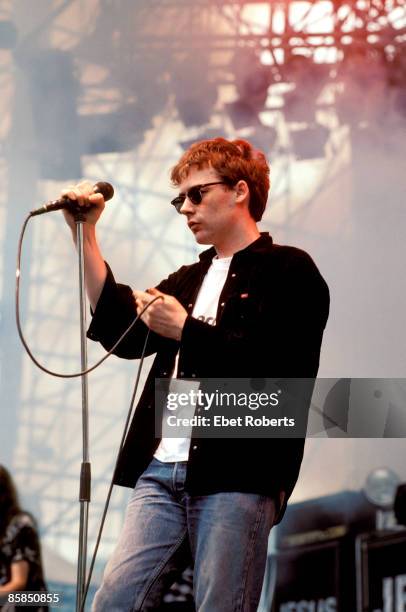 Photo of Jim REID and JESUS & MARY CHAIN, Jim Reid performing on stage at Montage Mountain, Pennsylvania