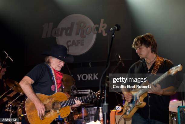 Photo of Lucas NELSON and Willie NELSON; Performing live on stage with son Lukas Nelson at the Sustainable Biodiesel Alliance Launch Party at the...
