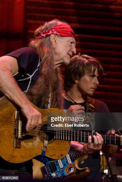 Photo of Lucas NELSON and Willie NELSON, Performing live on stage with son Lukas at Randall's Island, New York