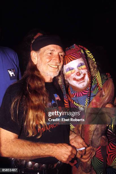 Photo of Willie NELSON and WAVY GRAVY, Willie Nelson and Wavy Gravy backstage at Farm Aid