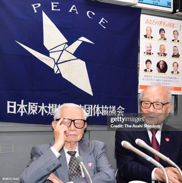 Japan Confederation of A- and H-Bomb Sufferers Organizations Co-Chairperson Terumi Tanaka and advisor Mikiso Iwasa speak during a press conference...