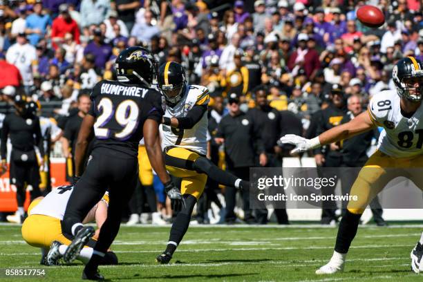 Pittsburgh Steelers kicker Chris Boswell kicks a field goal out of the hold of punter Jordan Berry on October 1 at M&T Bank Stadium in Baltimore, MD....