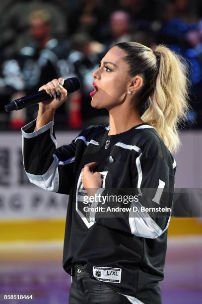 Singer Pia Toscano performs the national anthem before a game between the Los Angeles Kings and the Philadelphia Flyers at STAPLES Center on October...