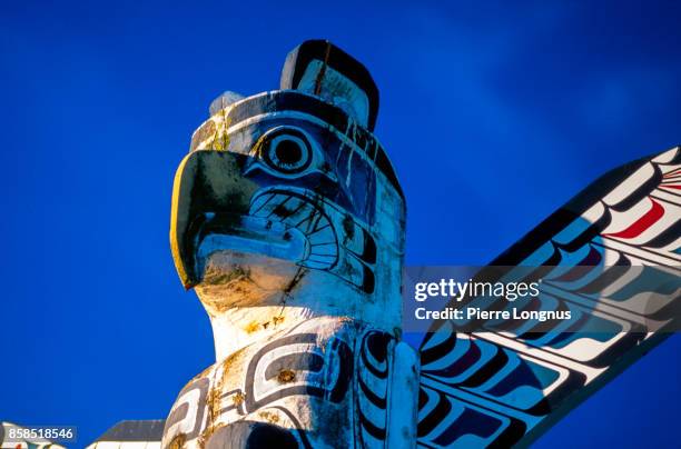 totem pole at brockton point, stanley park, vancouver, british columbia, canada - native american tribal pattern stock pictures, royalty-free photos & images