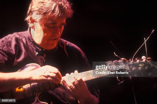 Photo of Fred FRITH and MASSACRE; Fred Frith performing on stage at the Southstreet Seaport