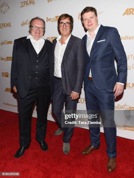 Producers Stefan Arndt, Uwe Schott and Michael Polle attend the premiere of Beta Film's 'Babylon Berlin' at The Theatre at Ace Hotel on October 6,...