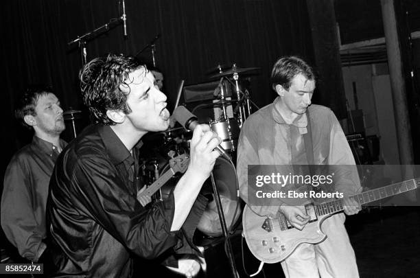Dave Allen, Jon King and Andy Gill of Gang of Four performing at Club 57 presents at Irving Plaza in New York City on November 13, 1980.