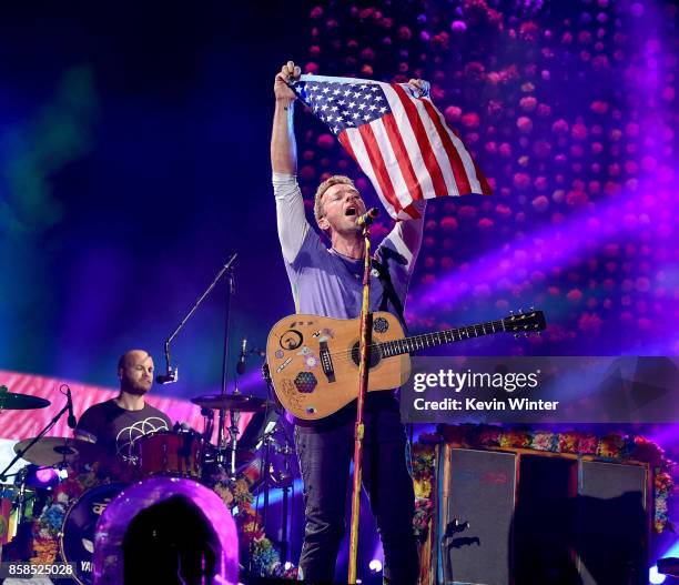 Musicians Will Champion and Chris Martin of Coldplay perform at the Rose Bowl on October 6, 2017 in Pasadena, California.