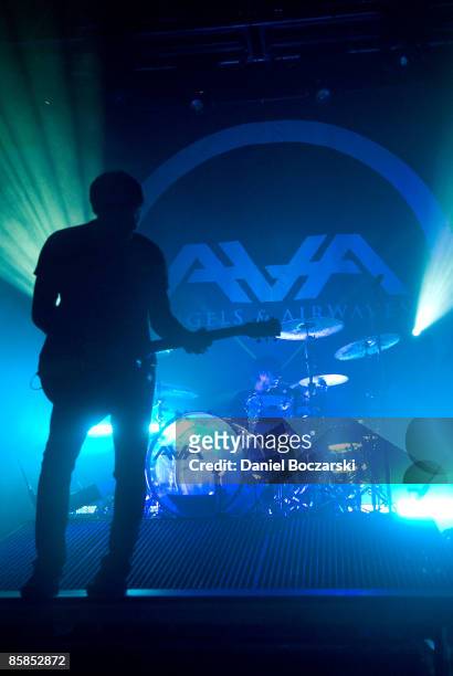 Photo of ANGELS & AIRWAVES and Adam WILLARD and Tom DELONGE, Tom DeLonge and drummer Adam Willard performing on stage