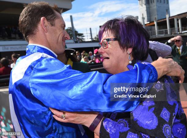 Hugh Bowman is about to hug an emotional part owner Debbie Kepitis after Winx won Race 5, Turnbull Stakes during Turnbull Stakes day at Flemington...