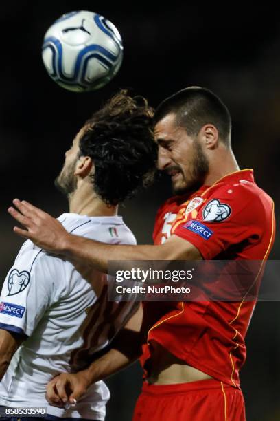 Marco Parolo of Italy national team and Gjoko Zajkov of FYR Macedonia national team vie for a header during the 2018 FIFA World Cup Russia qualifier...