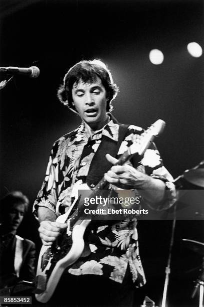 Photo of Ry COODER, performing live onstage, playing Fender Jaguar guitar