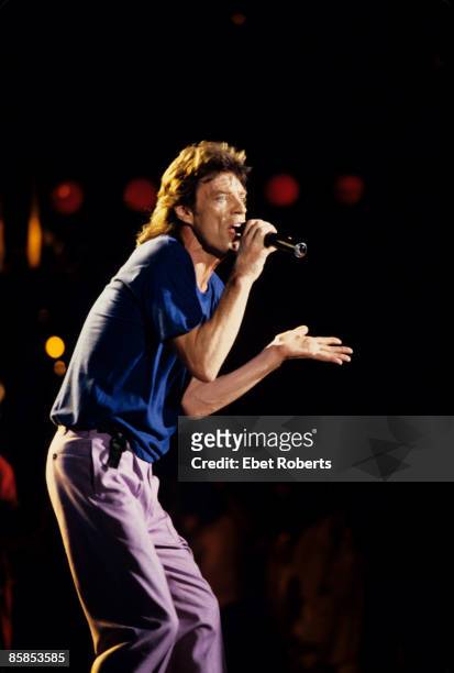 Photo of Mick JAGGER and LIVE AID, of the Rolling Stones, performing live onstage solo at Live Aid