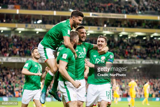 The Irish players celebrate after Daryl Murphy first goal during the FIFA World Cup 2018 Qualifying Round Group D match between Republic of Ireland...