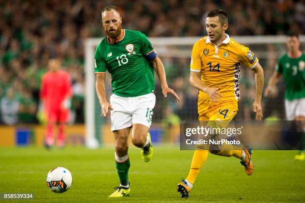 David Meyler of Ireland and Vitalie Bordian of Moldova in action during the FIFA World Cup 2018 Qualifying Round Group D match between Republic of...