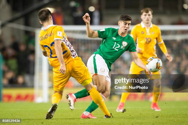 Callum O'Dowda of Ireland and Artiom Rozgoniuc of Moldova during the FIFA World Cup 2018 Qualifying Round Group D match between Republic of Ireland...