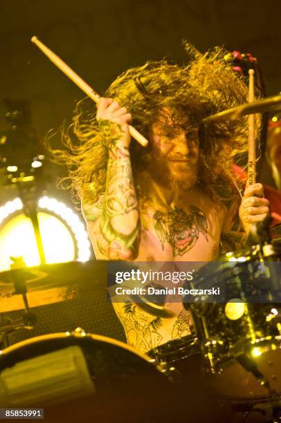 Photo of Andy HURLEY and FALL OUT BOY, Drummer Andy Hurley performing on stage at the Nike+ Human Race