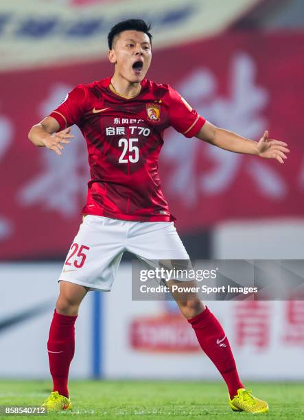 Guangzhou Evergrande midfielder Zou Zheng gestures during the AFC Champions League 2015 Semi Final 1st Leg match between Guangzhou Evergrande and...