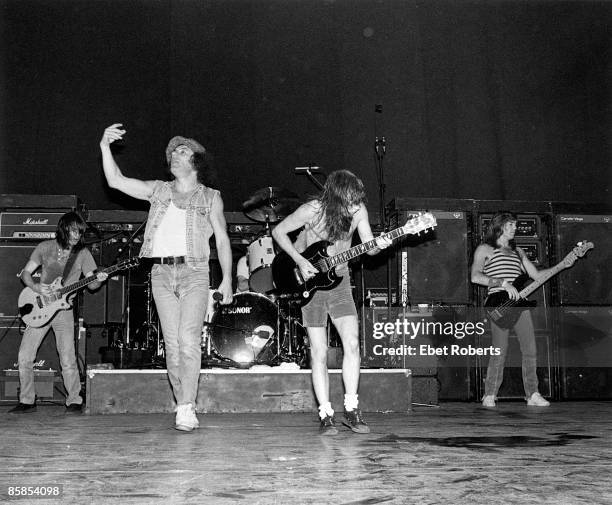 Photo of Cliff WILLIAMS and Angus YOUNG and Malcolm YOUNG and AC/DC and Brian JOHNSON, L-R Malcolm Young, Brian Johnson, Angus Young and Cliff...