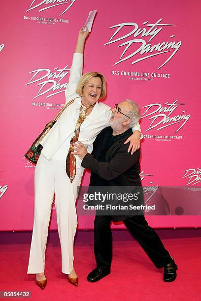 Stylist Udo Walz and Anja Hauptmann attend the musical premiere of 'Dirty Dancing' at Potsdamer Platz Theater on April 07, 2009 in Berlin.
