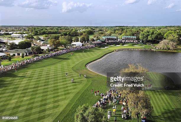 Arnold Palmer Invitational: Aerial view of Tiger Woods in action, shot after taking drop on No 18 during Saturday play at Bay Hill Club & Lodge....