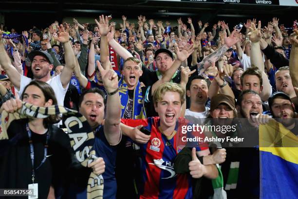 Jets fans celebrate during the round one A-League match between the Central Coast Mariners and the Newcastle Jets at Central Coast Stadium on October...