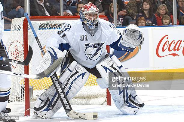 Karri Ramo of the Tampa Bay Lightning concentrates on the puck against the Edmonton Oilers at Rexall Place on February 24, 2009 in Edmonton, Alberta,...