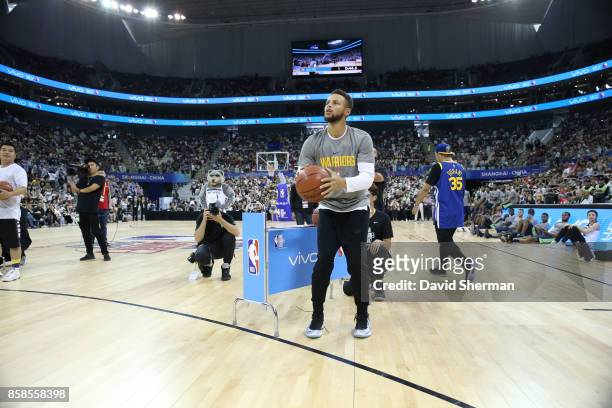Stephen Curry of the Golden State Warriors shoots the ball during fan day as part of 2017 NBA Global Games China on October 7, 2017 at the Oriental...