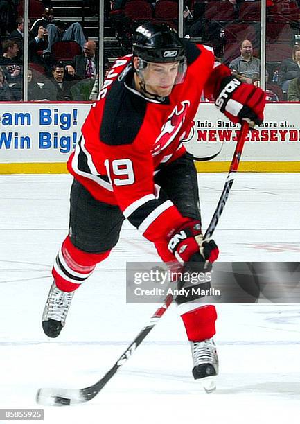 Travis Zajac of the New Jersey Devils fires a shot against the Toronto Maple Leafs at the Prudential Center on April 7, 2009 in Newark, New Jersey.