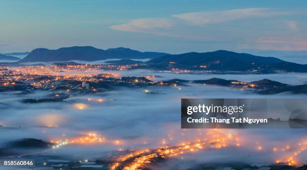 great view of dalat city in mist and light, vietnam - dalat stock pictures, royalty-free photos & images