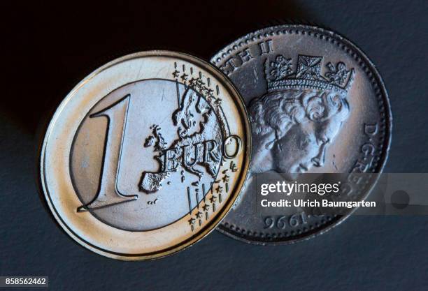 Symbol photo on the subject Brexit, European Union, Great Britain, etc. The picture shows a British pound coin with the portrait of Queen Elizabeth...