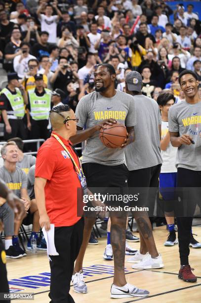 Kevin Durant of the Golden State Warriors smiles during fan day as part of 2017 NBA Global Games China on October 7, 2017 at the Oriental Sports...