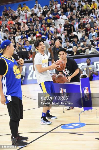 Chen Bolin smiles and laughs during fan day as part of 2017 NBA Global Games China on October 7, 2017 at the Oriental Sports Center in Shanghai,...