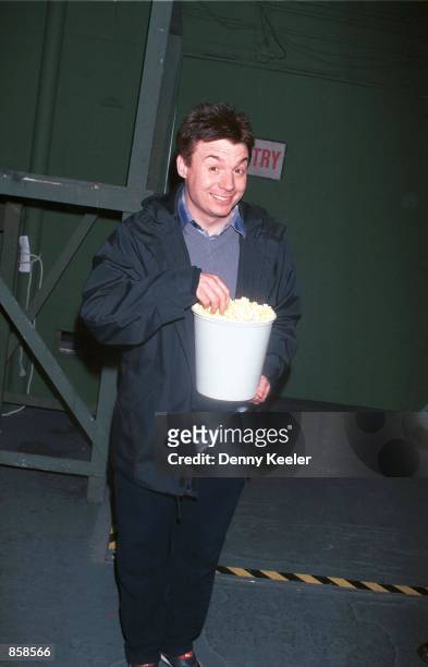 Hollywood, CA. Austin Powers star Mike Myers buys a bucket of popcorn at the Hollywood Bowl for the opening night gala of "Roll Over Beethoven"...